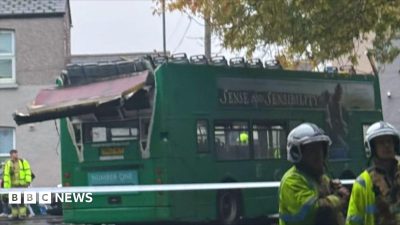 Three children injured after school bus roof ripped off in crash