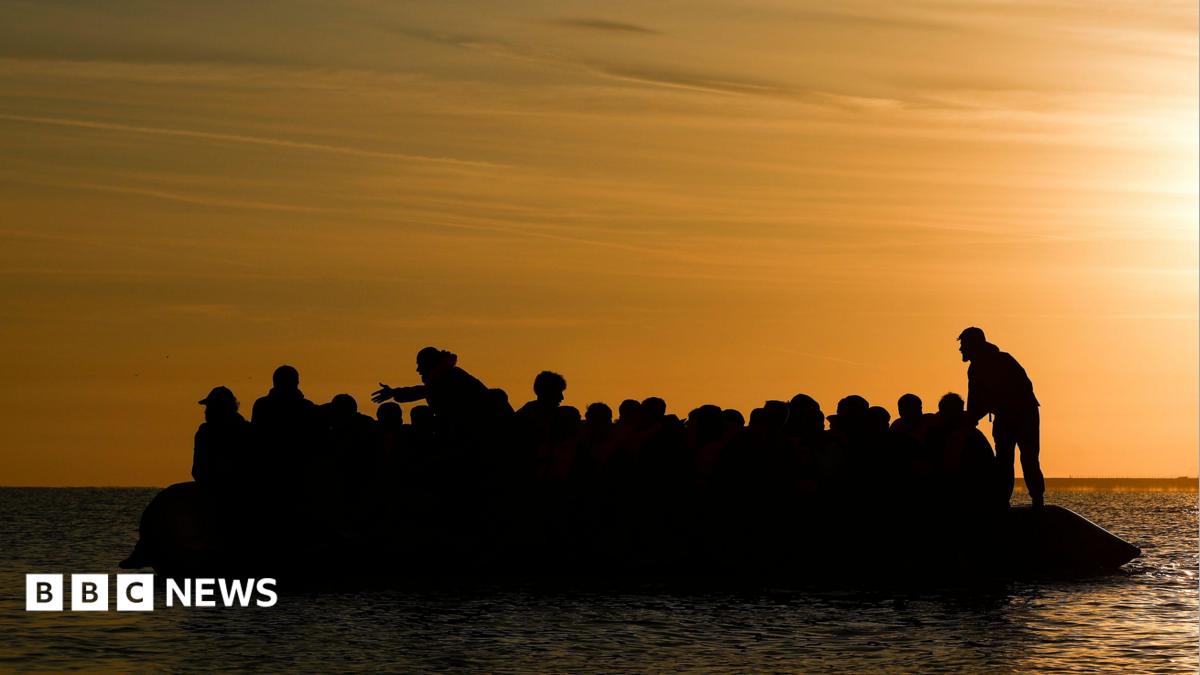 Record 128 people cross Channel in one small boat