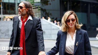 Russell Brand's wife tells his rape trial he is 'kind and a wonderful father'
