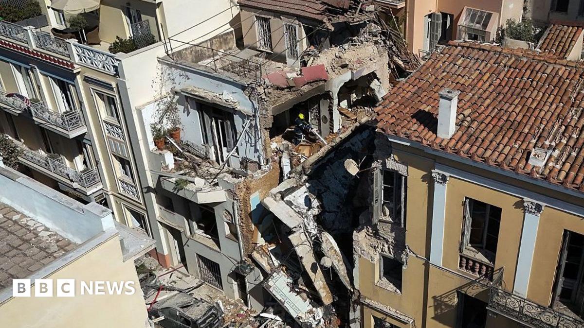 One dead and five missing after explosion destroys building close to Acropolis in Athens