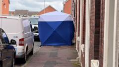 Man arrested on suspicion of murder after two people found dead at house
