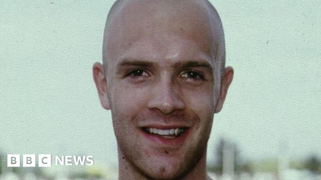 Ex-Olympian's wife 'feared he would kill her'