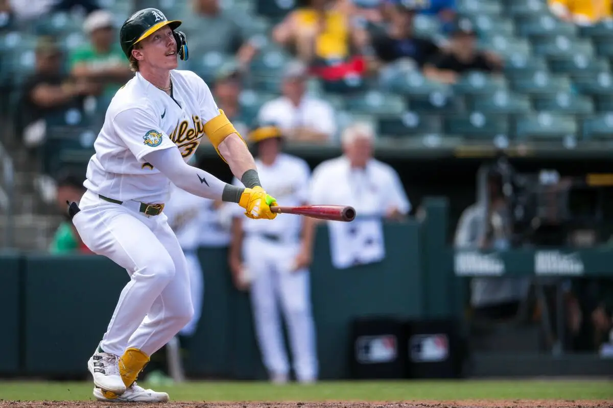 Mariners top Athletics 9-1, move into 1st place in AL West