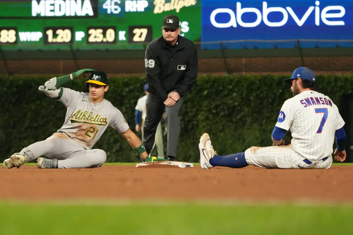 A’s rally for tie in eighth before Kurtz wins it in 10th