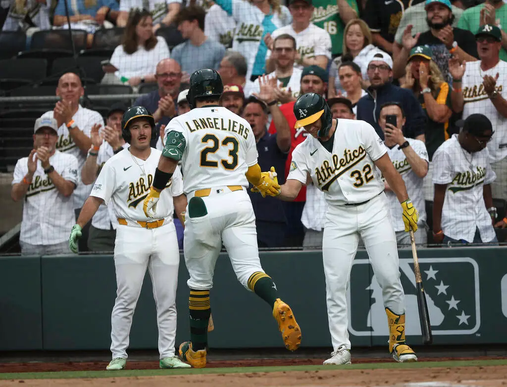 A’s blast 6 HRs, fall to Brewers in Las Vegas opener — PHOTOS
