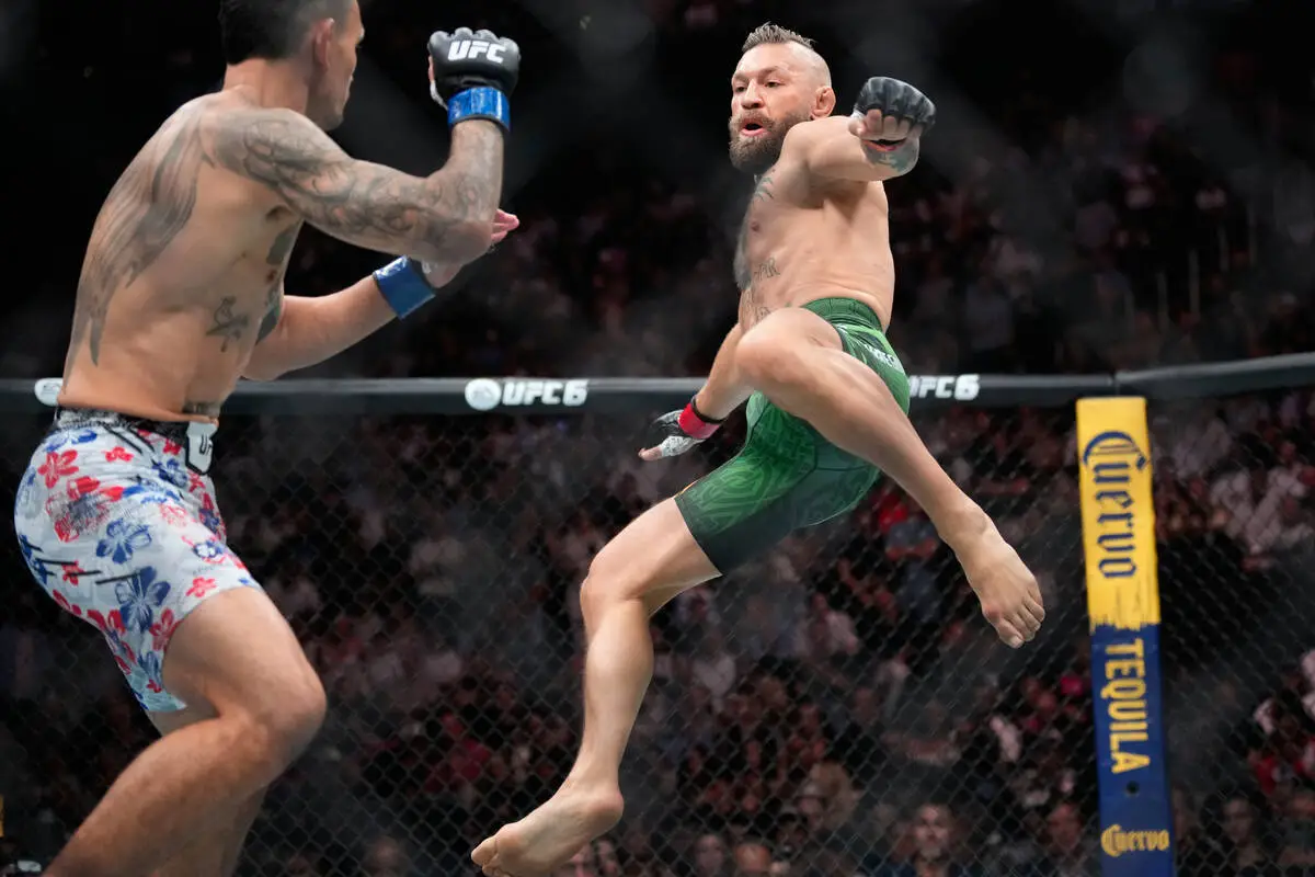 Following knee injury, McGregor outlines plan for surgery, rehab and another fight against Holloway