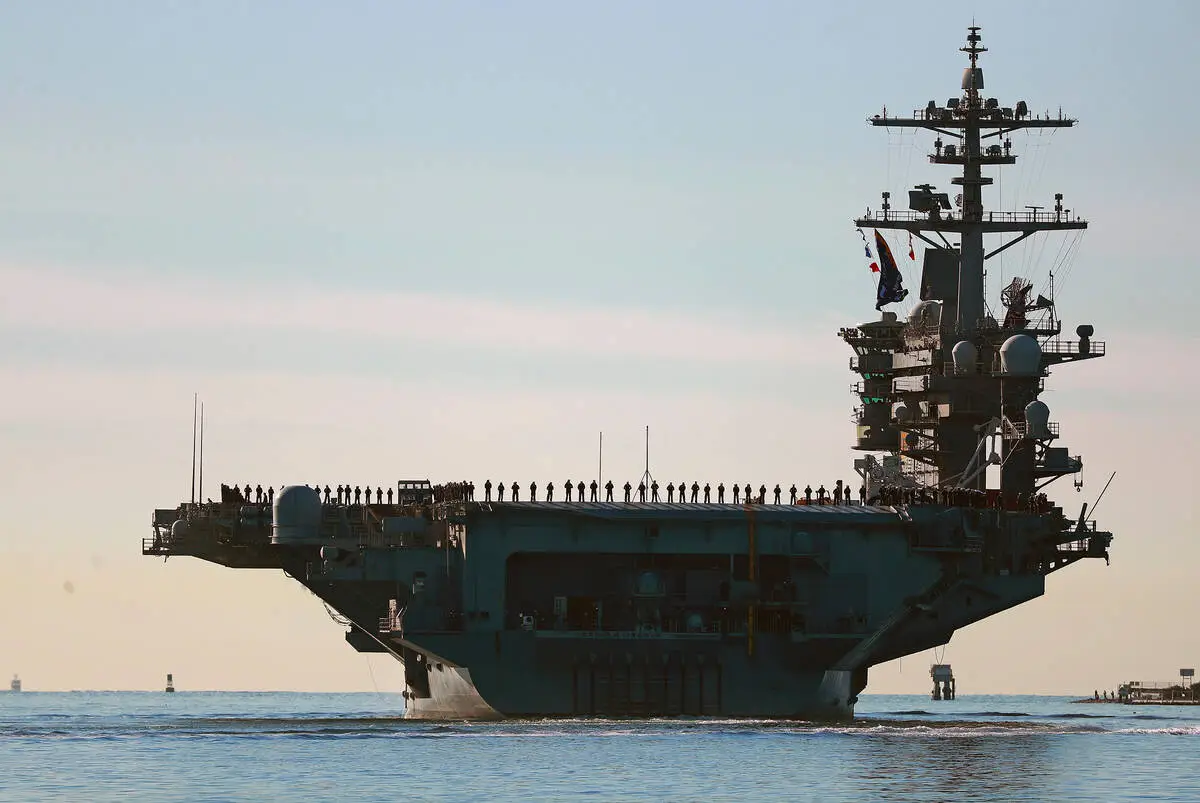 Top US commander visits aircraft carrier, Gaza talks in Egypt and other Mideast news