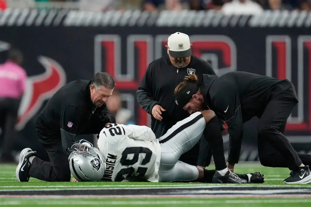 Raiders cornerback carted off field in Houston with knee injury